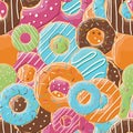 Seamless pattern with colorful tasty glossy donuts