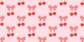 Seamless pattern with coquette bow and cherry on pink background, flat drawings, vector backdrop Royalty Free Stock Photo
