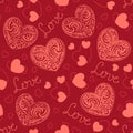 Seamless pattern with coral lacy hearts and silhouettes of small hearts.