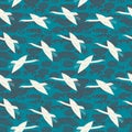 Seamless pattern cranes swans, herons birds fly, water lily, simple lines asian japanese chinese style blue gray background. trend Royalty Free Stock Photo