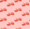 Seamless pattern with creative coral trendy sunglasses on pink pastel background