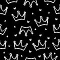 Seamless pattern crowns black background. Vector doodle luxury illustration.