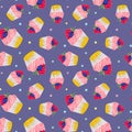 Seamless pattern with a cupcake with strawberries and blueberries and with pink cream. On a purple background. Muffin. Sweet Royalty Free Stock Photo