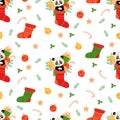 Seamless pattern with cute animal panda in Christmas sock with gift, gingerbread and Christmas balls on white background