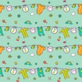 Seamless pattern with cute baby clothes. Royalty Free Stock Photo