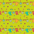 Seamless pattern with cute baby clothes. Royalty Free Stock Photo