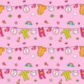 Seamless pattern with cute baby clothes. Royalty Free Stock Photo