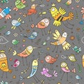 Seamless pattern with cute cartoon birds on gray background. Funny animals wallpaper. Doodle herbs and flowers print. Royalty Free Stock Photo