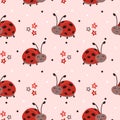 Seamless pattern with cute cartoon ladybug, flower and polka dot on pink background Royalty Free Stock Photo