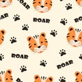 Seamless pattern cute cartoon tiger face, paw prints and the inscription roar, vector illustration Royalty Free Stock Photo