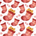 Seamless pattern with cute Cat hiding in woolen sock. Adorable playful kitten Christmas character. Royalty Free Stock Photo