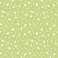 Seamless pattern with cute chamomile flowers on light green background