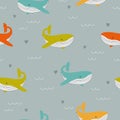 Seamless pattern with cute colorful whales. Vector baby illustration