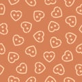 Seamless pattern with cute doodle beige heart shaped buttons on a soft cocoa color background