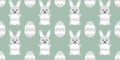 Seamless pattern with cute Easter bunnies and eggs. Festive pastel background Royalty Free Stock Photo