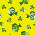 Seamless pattern with cute fish on yellow background. Vector cartoon animals colorful illustration. Adorable character for cards. Royalty Free Stock Photo