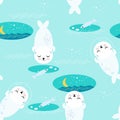 Seamless pattern with cute fur seals.Ice hole with fishes and waves. Royalty Free Stock Photo