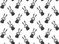 Seamless pattern of cute hand-drawn hare girls in polka dot dresses and with pigtails on a white background. Charming Easter Bunni Royalty Free Stock Photo