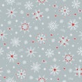 Seamless pattern with cute hand drawn snowflakes and little red hearts Royalty Free Stock Photo