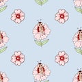 Seamless pattern with cute ladybug on flower on light blue background. Vector illustration. Endless background for Royalty Free Stock Photo