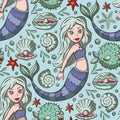 Seamless pattern with cute mermaids.