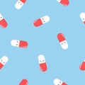 Seamless pattern with cute pink pills and capsules. Simple flat illustration on blue background