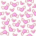 Seamless pattern with cute pink winged hearts. Valentine`s Day background. Vector template.