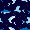 Seamless pattern of cute sharks isolated on dark blue, animal marine print Royalty Free Stock Photo