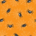 Seamless pattern with cute spiders and spider webs. Royalty Free Stock Photo