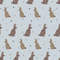 Seamless pattern of cute spotted brown bunnies sitting in line on light blue background with colored circles