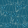 Seamless pattern with cute umbrellas. Vector