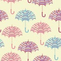 Seamless pattern with cute umbrellas. Vector