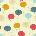 Seamless pattern with cute umbrellas. Vector