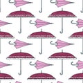 Seamless pattern with cute umbrellas. Vector illustration. Girly fashion background. Graphic cartoon retro texture. Vintage weathe