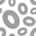 Seamless pattern of 3D geometric dotted rounded shapes. Donuts. Black and white colors