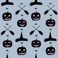 A seamless pattern for the day of Halloween, with pumpkins, a broom and a witch hat