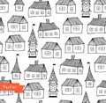 Seamless pattern with decorative houses in pastel colors. City background. Royalty Free Stock Photo