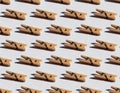 Seamless pattern with decorative wood clothespin with hard light Royalty Free Stock Photo