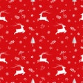 Seamless pattern with deers and snowflakes on red background Royalty Free Stock Photo