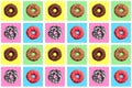 Seamless pattern of different donuts on bright checkered multi-colored background top view, tasty doughnuts on chequered backdrop Royalty Free Stock Photo