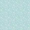 Seamless pattern. Different white snowflakes on a light blue background. Winter texture Royalty Free Stock Photo