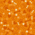 Seamless pattern with dog paw print, bone and hearts. Orange background