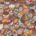 Seamless pattern with doodle-style cupcakes.