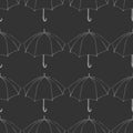 Seamless pattern with doodle umbrellas. For fabric, textile, wallpaper. Vector Illustration. Hand drawn sketch. Dark gray