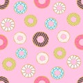 Seamless pattern of doughnuts with colored icing. Trendy beautiful donuts Pink background Royalty Free Stock Photo