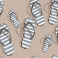 Seamless pattern of drawn family  beach slippers on beach sand Royalty Free Stock Photo