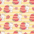 Seamless pattern with Easter bunny with paschal egg and flowers on striped yellow background. Cute kawaii animal