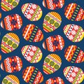 Seamless pattern with Easter eggs decorated with geometric patterns. Vector