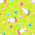 Seamless pattern with easter spring bunny in flowers and butterfly on green background in cartoon style Royalty Free Stock Photo