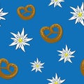 Seamless pattern edelweiss flower and pretzel on blue background